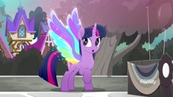 Size: 1920x1080 | Tagged: safe, screencap, character:twilight sparkle, character:twilight sparkle (alicorn), species:alicorn, species:pony, friendship is magic: rainbow roadtrip, g4, my little pony: friendship is magic, colored wings, discovery family logo, female, mare, multicolored wings, rainbow wings, raised hoof, solo, toyetic, wing bling, wings