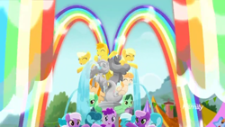 Size: 1366x768 | Tagged: safe, screencap, species:earth pony, species:pony, species:unicorn, friendship is magic: rainbow roadtrip, g4, my little pony: friendship is magic, background pony, blue pony, crowd, discovery family logo, eyes closed, female, fountain, green pony, hope hollow, indigo pony, male, mare, orange pony, rainbow, spewing, stallion, unnamed pony, water, yellow pony