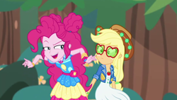 Size: 1280x720 | Tagged: safe, screencap, character:applejack, character:pinkie pie, episode:accountibilibuddies, g4, my little pony:equestria girls, accountibilibuddies: pinkie pie, applejack's sunglasses, bush, clothing, confused, cute, diapinkes, evil grin, geode of sugar bombs, grin, hair bun, hat, jacket, looking at someone, magical geodes, outdoors, raised eyebrow, sitting, smiling, standing, sunglasses, tree