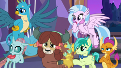 Size: 1920x1080 | Tagged: safe, screencap, character:gallus, character:ocellus, character:sandbar, character:silverstream, character:smolder, character:yona, species:changedling, species:changeling, species:classical hippogriff, species:dragon, species:earth pony, species:griffon, species:hippogriff, species:pony, species:reformed changeling, species:yak, episode:she's all yak, g4, my little pony: friendship is magic, best friends, bow, bow tie, claws, cloven hooves, colored hooves, crossed arms, cute, diaocelles, diastreamies, dragoness, female, flying, folded wings, gallabetes, grin, hair bow, hands on hip, horns, jewelry, male, monkey swings, necklace, raised eyebrow, sandabetes, smiling, smolderbetes, smugder, spread wings, student six, talons, teenager, trophy, wings, yonadorable