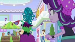 Size: 1280x718 | Tagged: safe, screencap, character:curly winds, character:juniper monstar, character:juniper montage, character:mystery mint, character:scribble dee, character:sophisticata, character:starlight glimmer, character:velvet sky, character:wiz kid, equestria girls:mirror magic, g4, my little pony:equestria girls, background human, behind, canterlot mall, carlos thunderbolt, curly winds, female, giantess, juniper monstar, macro, male, mirror, some blue guy, sophisticata, velvet sky, wiz kid