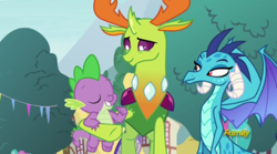 Size: 500x278 | Tagged: safe, screencap, character:princess ember, character:spike, character:thorax, species:changeling, species:dragon, species:reformed changeling, episode:triple threat, g4, my little pony: friendship is magic, cute, discovery family logo, eyes closed, female, hug, male, smiling, spikelove, spread wings, wings