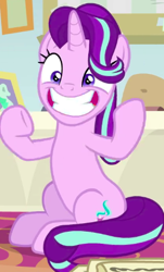 Size: 301x497 | Tagged: safe, screencap, character:starlight glimmer, species:pony, species:unicorn, episode:a horse shoe-in, g4, my little pony: friendship is magic, adorable face, cropped, cute, female, glimmerbetes, grin, mare, raised hoof, screaming internally, sitting, smiling, solo, starlight's office