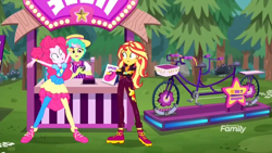 Size: 1366x768 | Tagged: safe, screencap, character:pinkie pie, character:sunset shimmer, equestria girls:sunset's backstage pass, g4, my little pony:equestria girls, belle barker, bicycle, booth, carny, discovery family logo, forest, geode of empathy, geode of sugar bombs, joy buzzer, magical geodes, prize, shoes, sneakers, tandem bicycle