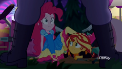 Size: 1366x768 | Tagged: safe, screencap, character:pinkie pie, character:sunset shimmer, equestria girls:sunset's backstage pass, g4, my little pony:equestria girls, broken, clothing, discovery family logo, female, food cart, framed by legs, max steele, night, pointing, shoes, sneakers, wristband
