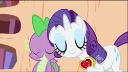 Size: 1280x720 | Tagged: safe, screencap, character:rarity, character:spike, species:dragon, species:pony, species:unicorn, episode:secret of my excess, g4, my little pony: friendship is magic, bookshelf, cute, cutie mark, eyes closed, eyeshadow, female, fire ruby, gem, golden oaks library, hub logo, jewelry, makeup, male, mare, necklace, nuzzling, ruby, shipping fuel, spikelove