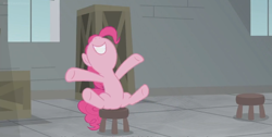 Size: 1366x686 | Tagged: safe, screencap, character:pinkie pie, species:pony, episode:the last laugh, g4, my little pony: friendship is magic, box, crate, factory, gag factory, sitting, smiling, solo, stool, window