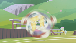 Size: 1366x768 | Tagged: safe, screencap, character:ambrosia, character:summer breeze, species:pony, episode:2-4-6 greaaat, bleachers, blurry, buckball, fence, field, good trick, outdoors, spinning