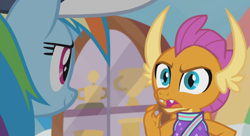 Size: 1248x680 | Tagged: safe, screencap, character:rainbow dash, character:smolder, episode:2-4-6 greaaat, angry, cabinet, cap, cheerleader, cheerleader outfit, cheerleader smolder, clothing, gym, hat, trophy, whistle