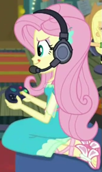 Size: 331x554 | Tagged: safe, screencap, character:fluttershy, episode:costume conundrum, g4, my little pony:equestria girls, controller, cropped, cute, feet, gamer fluttershy, headphones, headset, headset mic, sandals, sitting, solo focus, tongue out