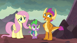 Size: 1920x1080 | Tagged: safe, screencap, character:fluttershy, character:smolder, character:spike, species:dragon, species:pegasus, species:pony, episode:sweet and smoky, g4, my little pony: friendship is magic, baby, baby dragon, backpack, claws, dragon lands, dragoness, fangs, female, folded wings, friends, horns, mare, open mouth, smiling, teenaged dragon, teenager, trio, winged spike, wings