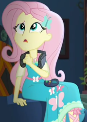 Size: 686x958 | Tagged: safe, screencap, character:fluttershy, episode:costume conundrum, g4, my little pony:equestria girls, controller, couch, cropped, cute, female, geode of fauna, headset, headset mic, looking up, magical geodes, sitting, solo, sunset's apartment, thinking