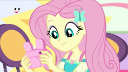 Size: 1280x720 | Tagged: safe, screencap, character:fluttershy, equestria girls:holidays unwrapped, g4, my little pony:equestria girls, camera, clothing, geode of fauna, magical geodes, pink camera, plusplus, smiling