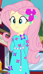 Size: 520x895 | Tagged: safe, screencap, character:fluttershy, episode:lost and pound, g4, my little pony:equestria girls, cropped, female, flower, flower in hair, food, food truck, geode of fauna, lost and pound: fluttershy, magical geodes, smiling, solo, standing