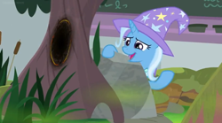 Size: 1600x888 | Tagged: safe, screencap, character:trixie, species:pony, episode:a horse shoe-in, g4, my little pony: friendship is magic, bog, burnt, cattails, chalkboard, grass, nervous grin, rock, solo, tree