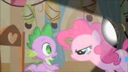 Size: 1280x720 | Tagged: safe, screencap, character:pinkie pie, character:spike, species:dragon, species:earth pony, species:pony, episode:party of one, g4, my little pony: friendship is magic, chair, duo, female, interrogation, lamp, looking at each other, male, mare, smiling, smirk, smug, sugarcube corner