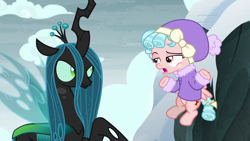 Size: 1280x720 | Tagged: safe, screencap, character:cozy glow, character:queen chrysalis, episode:frenemies, g4, my little pony: friendship is magic, bickering, clothing, cozy glow is not amused, crown, female, filly, flapping, flying, foal, former queen chrysalis, freckles, glare, insect wings, jacket, jewelry, lidded eyes, raised eyebrow, raised hoof, regalia, shrug, snow, spread wings, wings, winter outfit