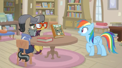 Size: 1600x900 | Tagged: safe, screencap, character:a.k. yearling, character:rainbow dash, species:pony, episode:daring doubt, g4, my little pony: friendship is magic, book, bookshelf, cape, chair, clothing, cup, cushion, disguise, fake beard, george r.r. martin, glasses, hat, jacket, library, martingale, newsboy hat, pen, picture frame, rug, sign, sitting, table, window