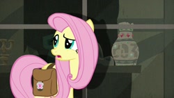Size: 1920x1080 | Tagged: safe, screencap, character:fluttershy, species:pony, episode:daring doubt, g4, my little pony: friendship is magic, saddle bag, solo, vase