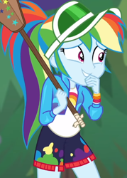 Size: 412x576 | Tagged: safe, screencap, character:rainbow dash, equestria girls:sunset's backstage pass, g4, my little pony:equestria girls, accidental spanking, cap, clothing, cropped, cute, dashabetes, embarrassed, geode of super speed, grin, hat, jacket, magical geodes, paddle, rainbow, shirt, shorts, smiling, solo, sorry, t-shirt