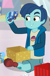 Size: 423x642 | Tagged: safe, screencap, equestria girls:holidays unwrapped, g4, my little pony:equestria girls, clothing, cropped, crossed legs, cute, henry handle, legs, manestrum, shoes, smiling, sneakers, toy, toy car
