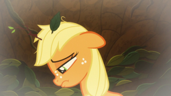 Size: 1920x1080 | Tagged: safe, screencap, character:applejack, species:earth pony, species:pony, episode:going to seed, g4, my little pony: friendship is magic, female, filly, filly applejack, floppy ears, freckles, leaves, sad, solo, younger