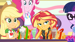 Size: 1164x655 | Tagged: safe, screencap, character:applejack, character:fluttershy, character:pinkie pie, character:sunset shimmer, character:twilight sparkle, character:twilight sparkle (scitwi), species:eqg human, equestria girls:holidays unwrapped, g4, my little pony:equestria girls, applejack's hat, canterlot mall, clothing, cowboy hat, dashing through the mall, denim skirt, female, freckles, geode of empathy, geode of sugar bombs, geode of super strength, geode of telekinesis, glasses, hat, magical geodes, shirt, shoes, skirt, stetson, table