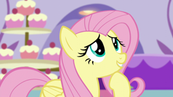 Size: 1280x720 | Tagged: safe, screencap, character:fluttershy, species:pegasus, species:pony, episode:canterlot boutique, g4, my little pony: friendship is magic, cupcake, cute, female, food, mare, shyabetes, smiling, solo