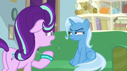 Size: 1280x720 | Tagged: safe, screencap, character:starlight glimmer, character:trixie, species:pony, episode:student counsel, book, butt, couch, floppy ears, plot, scroll, starlight's office