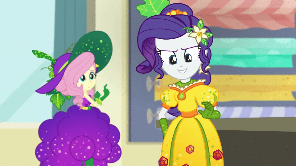 Size: 960x540 | Tagged: safe, screencap, character:fluttershy, character:rarity, equestria girls:holidays unwrapped, g4, my little pony:equestria girls, animated, braid, clothing, cornucopia costumes, curtains, desk, dress, duo, duo female, fabric, female, flower, food, gem, gif, grapes, hat, inflatable, inflatable dress, inflating, leaf, o come all ye squashful, skirt inflation, surprised, wall, window