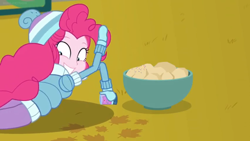 Size: 1600x900 | Tagged: safe, screencap, character:pinkie pie, equestria girls:holidays unwrapped, g4, my little pony:equestria girls, bowl, clothing, food, jacket, lying down, mittens, potato, solo, sprinkles, toque, winter outfit