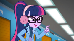Size: 1600x898 | Tagged: safe, screencap, character:twilight sparkle, character:twilight sparkle (scitwi), species:eqg human, equestria girls:holidays unwrapped, g4, my little pony:equestria girls, ceiling light, clothing, glasses, pointing, ponytail, solo, squint, winter outfit