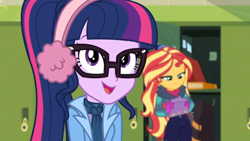 Size: 1600x900 | Tagged: safe, screencap, character:sunset shimmer, character:twilight sparkle, character:twilight sparkle (scitwi), species:eqg human, equestria girls:holidays unwrapped, g4, my little pony:equestria girls, bag, book, clothing, earmuffs, glasses, gloves, jacket, lockers, ponytail, winter outfit