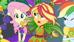 Size: 1600x900 | Tagged: safe, screencap, character:fluttershy, character:rainbow dash, character:rarity, character:sunset shimmer, equestria girls:holidays unwrapped, g4, my little pony:equestria girls, alternate hairstyle, carrot, cornucopia costumes, curls, food, frown, leaves, o come all ye squashful, shrug, spikes