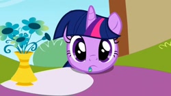 Size: 1280x720 | Tagged: safe, screencap, character:twilight sparkle, character:twilight sparkle (unicorn), species:pony, species:unicorn, episode:the ticket master, g4, my little pony: friendship is magic, eating, eating flower, female, flower, mare, ponyville, solo, staring at you, vase