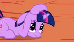 Size: 1280x720 | Tagged: safe, screencap, character:twilight sparkle, species:pony, species:unicorn, episode:the ticket master, g4, my little pony: friendship is magic, covering, floppy ears, golden oaks library, solo