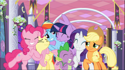 Size: 1672x941 | Tagged: safe, screencap, character:applejack, character:fluttershy, character:pinkie pie, character:rainbow dash, character:rarity, character:spike, character:twilight sparkle, character:twilight sparkle (alicorn), species:alicorn, species:dragon, species:earth pony, species:pegasus, species:pony, species:unicorn, episode:the summer sun setback, g4, my little pony: friendship is magic, best friends, cropped, cute, eyes closed, female, group, group hug, hug, mane seven, mane six, mare, raised hoof, smiling, spread wings, winged spike, wings