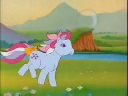 Size: 771x577 | Tagged: safe, screencap, character:sweet stuff, episode:the magic coins, g1, my little pony 'n friends, bow, bubble, cute, meadow, river, sweet sweet stuff, tail bow