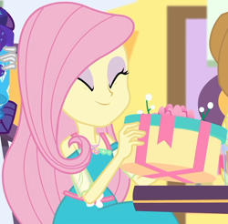 Size: 1000x983 | Tagged: safe, screencap, character:fluttershy, character:rarity, equestria girls:holidays unwrapped, g4, my little pony:equestria girls, applejack's hat, canterlot mall, chair, clothing, cowboy hat, cropped, cute, dashing through the mall, dress, eyes closed, female, flower, geode of fauna, gift box, gift giving, hat, jewelry, magical geodes, mall, necklace, present, shyabetes, sitting, smiling, table, waistband