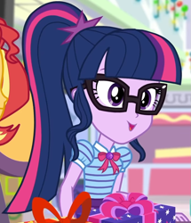 Size: 753x877 | Tagged: safe, screencap, character:sunset shimmer, character:twilight sparkle, character:twilight sparkle (scitwi), species:eqg human, equestria girls:holidays unwrapped, g4, my little pony:equestria girls, bow tie, canterlot mall, chair, clothing, collar, cropped, dashing through the mall, female, geode of telekinesis, gift box, gift giving, glasses, jewelry, magical geodes, mall, ponytail, present, shirt, short sleeves, sitting, skirt, smiling, table