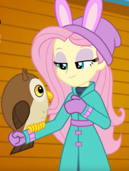Size: 771x1027 | Tagged: safe, screencap, character:fluttershy, species:bird, species:owl, equestria girls:holidays unwrapped, g4, my little pony:equestria girls, chad (owl), clothing, coat, cropped, cute, hat, mittens, self-storage facility, solo, winter break-in, winter coat, winter outfit