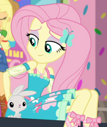 Size: 718x852 | Tagged: safe, screencap, character:angel bunny, character:applejack, character:fluttershy, species:rabbit, episode:tip toppings, g4, my little pony:equestria girls, animal, cropped, cute, eyeshadow, female, geode of fauna, legs, lidded eyes, magical geodes, makeup, offscreen character, shyabetes, sidewalk, sitting, tip toppings: fluttershy