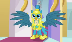 Size: 421x247 | Tagged: safe, screencap, character:gallus, species:griffon, episode:the last problem, g4, my little pony: friendship is magic, armor, armored chest, doorway, hallway, implied twilight sparkle, looking at someone, metal claws, older, older gallus, open mouth, royal guard, royal guard armor, royal guard gallus, smiling, solo, spread wings, wings