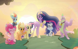 Size: 651x410 | Tagged: safe, screencap, character:applejack, character:fluttershy, character:pinkie pie, character:rainbow dash, character:rarity, character:spike, character:twilight sparkle, character:twilight sparkle (alicorn), species:alicorn, species:dragon, species:earth pony, species:pegasus, species:pony, species:unicorn, episode:the last problem, g4, my little pony: friendship is magic, crown, end of ponies, ethereal mane, female, gigachad spike, jewelry, male, mane seven, mane six, mare, older, older applejack, older fluttershy, older mane seven, older mane six, older pinkie pie, older rainbow dash, older rarity, older spike, older twilight, princess twilight 2.0, raised hoof, regalia, smiling, sunset, waving