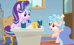 Size: 858x521 | Tagged: safe, screencap, character:cozy glow, character:starlight glimmer, species:pegasus, species:pony, species:unicorn, episode:marks for effort, g4, my little pony: friendship is magic, blanket, chocolate, covered, desk, duo, empathy cocoa, food, glow, glowing cup, glowing horn, hoof hold, hooves on the table, horn, hot chocolate, looking at each other, looking at someone, marshmallows, open mouth, sitting, starlight's office