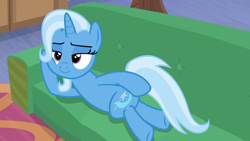 Size: 1280x720 | Tagged: safe, screencap, character:trixie, episode:on the road to friendship, couch, draw me like one of your french girls, side, smiling, stupid sexy trixie