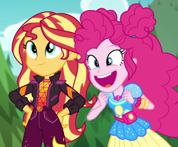 Size: 1279x1058 | Tagged: safe, screencap, character:pinkie pie, character:sunset shimmer, equestria girls:sunset's backstage pass, g4, my little pony:equestria girls, clothing, cropped, duo, duo female, excited, faec, female, geode of empathy, geode of sugar bombs, happy, jacket, magical geodes, music festival outfit, open mouth, outdoors