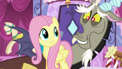 Size: 1280x720 | Tagged: safe, screencap, character:discord, character:fluttershy, species:draconequus, species:pegasus, species:pony, episode:what about discord?, g4, my little pony: friendship is magic, carousel boutique, duo, mannequin, smiling, snaggletooth