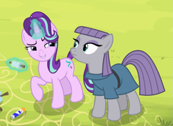 Size: 1047x767 | Tagged: safe, screencap, character:maud pie, character:starlight glimmer, species:earth pony, species:pony, species:unicorn, episode:rock solid friendship, g4, my little pony: friendship is magic, bonding, clothing, cropped, cute, duo, emotionless, eyeshadow, female, frown, glowing horn, glue stick, grin, horn, kite, kite flying, lidded eyes, looking at each other, magic, makeup, mare, narrowed eyes, raised eyebrow, raised hoof, smiling, telekinesis