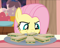 Size: 1192x943 | Tagged: safe, screencap, character:fluttershy, species:pegasus, species:pony, episode:discordant harmony, g4, my little pony: friendship is magic, cropped, female, food, grin, mare, plate, sandwich, smiling, solo